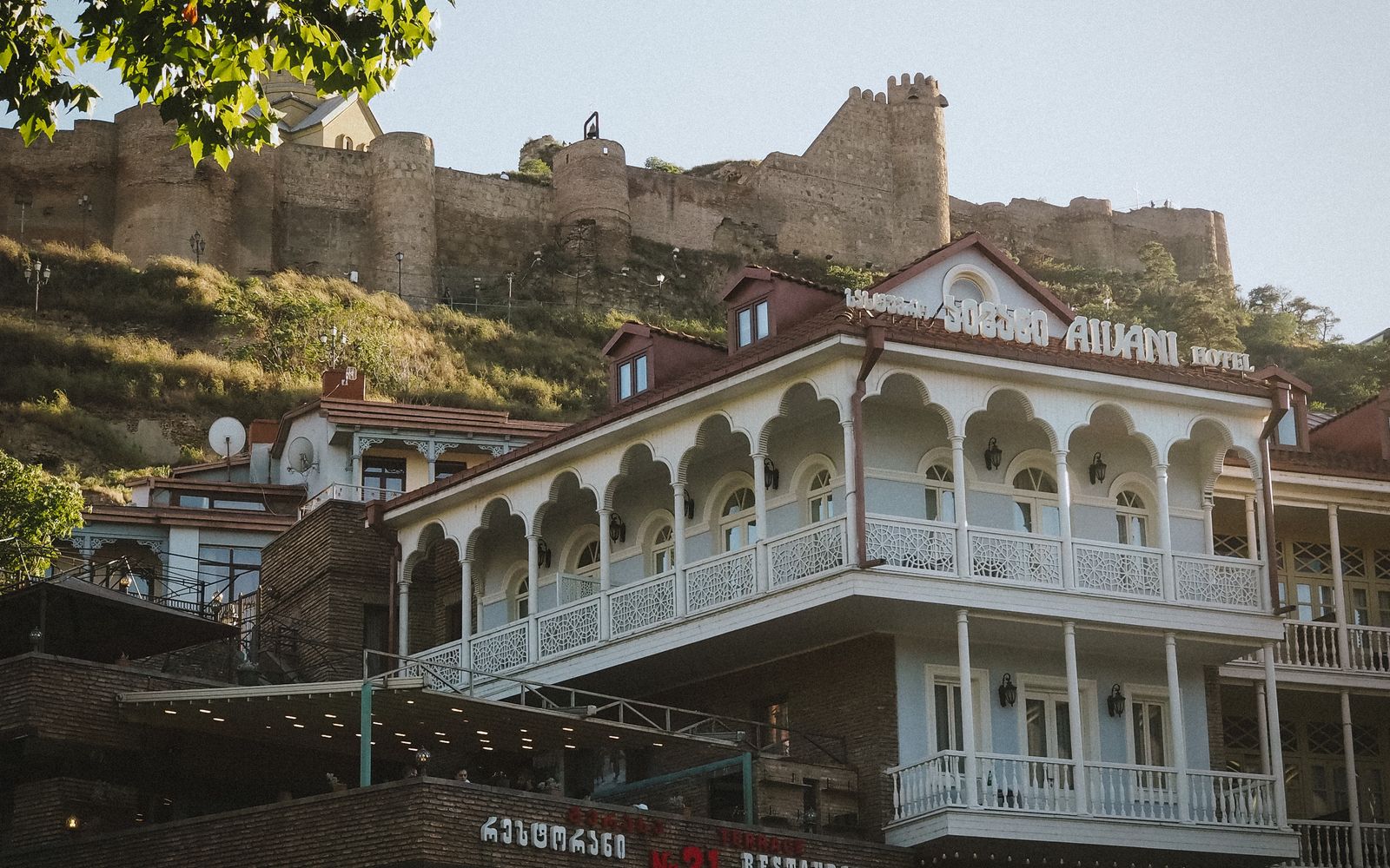 Traditional balconied houses below Narikala Fortress in the Old Town of Tbilisi, Georgia